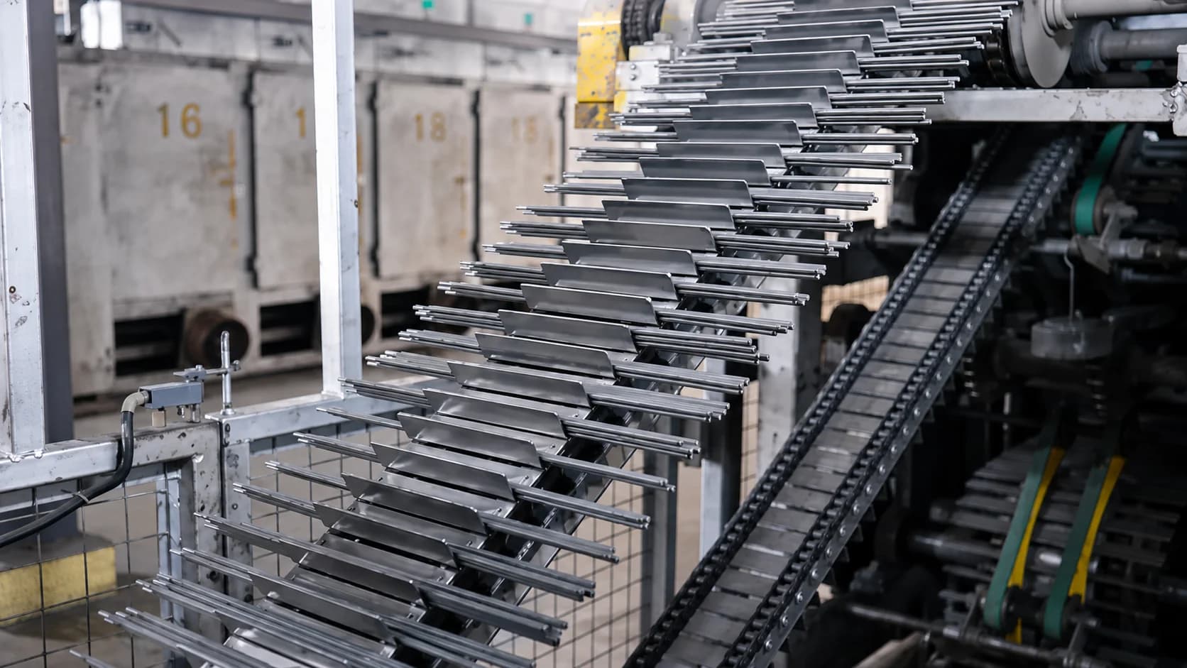 Electrode carrier racks feeding the drying ovens